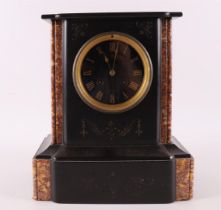 A mantel clock in black marble case, France, around 1900.