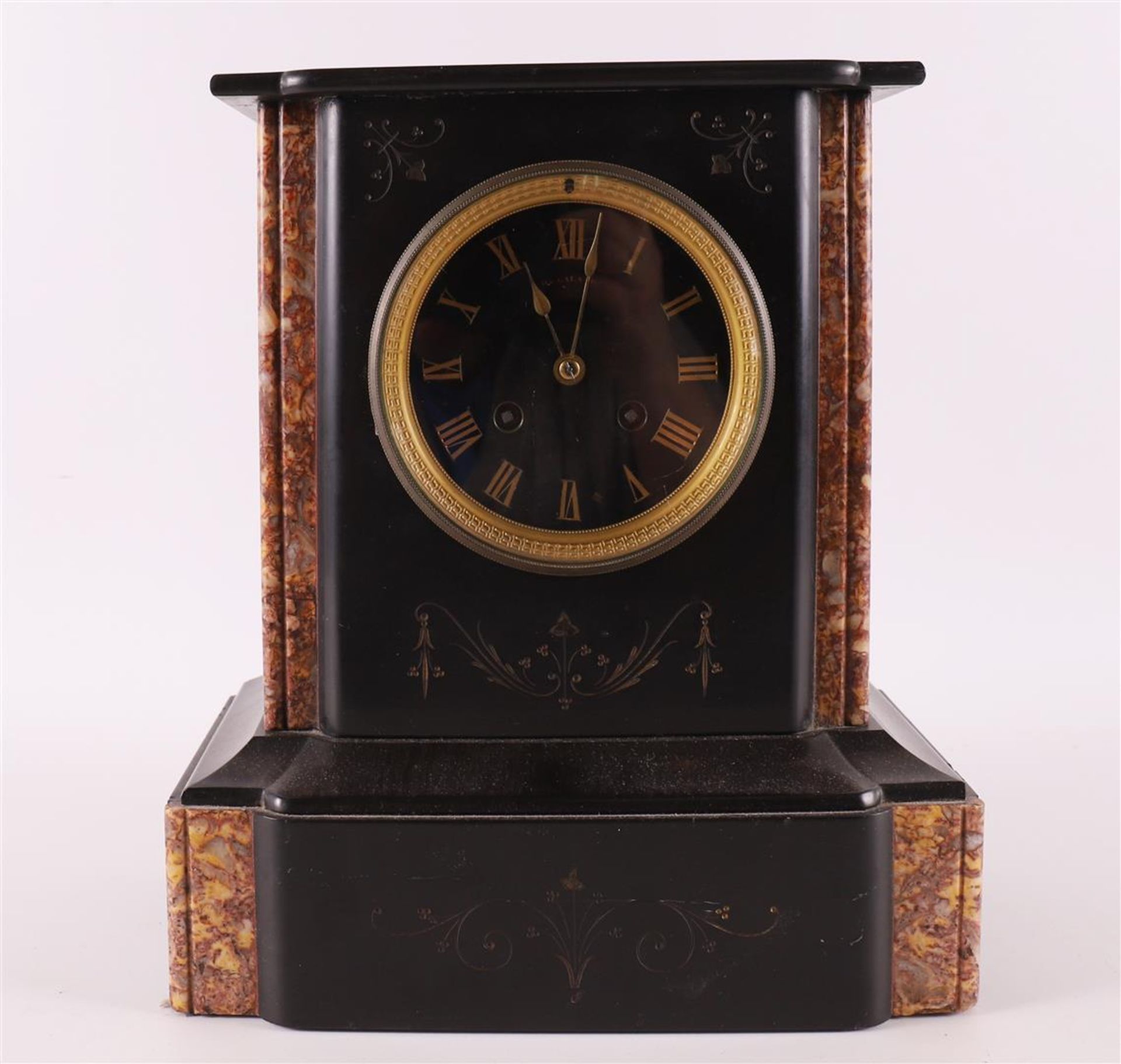 A mantel clock in black marble case, France, around 1900.