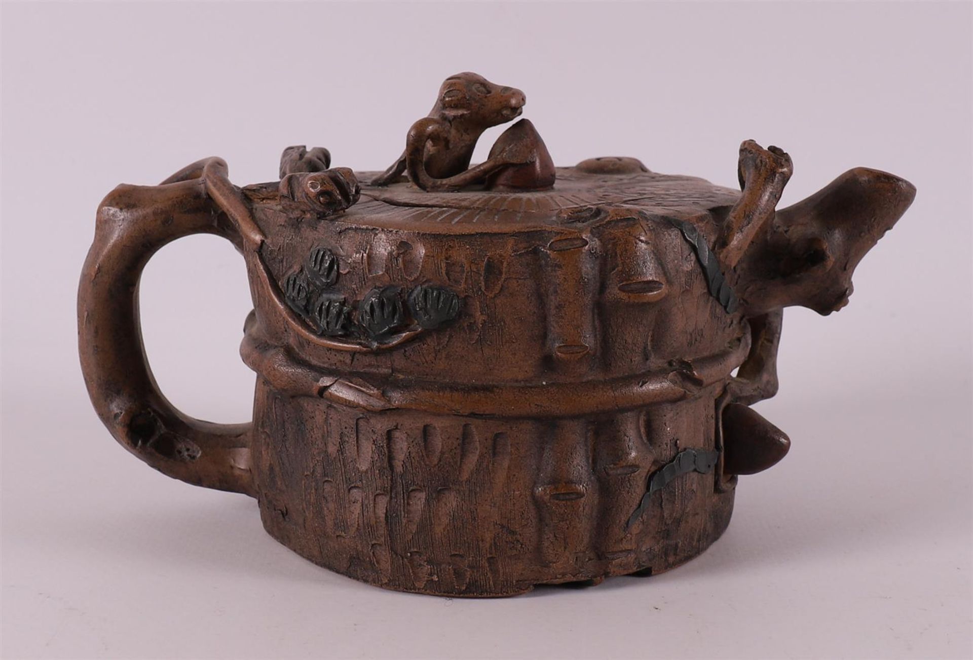 A yixing stoneware tree trunk-shaped teapot, China, 20th century.