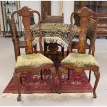 A pair of walnut glued Queen Anne chairs, England 18th century.