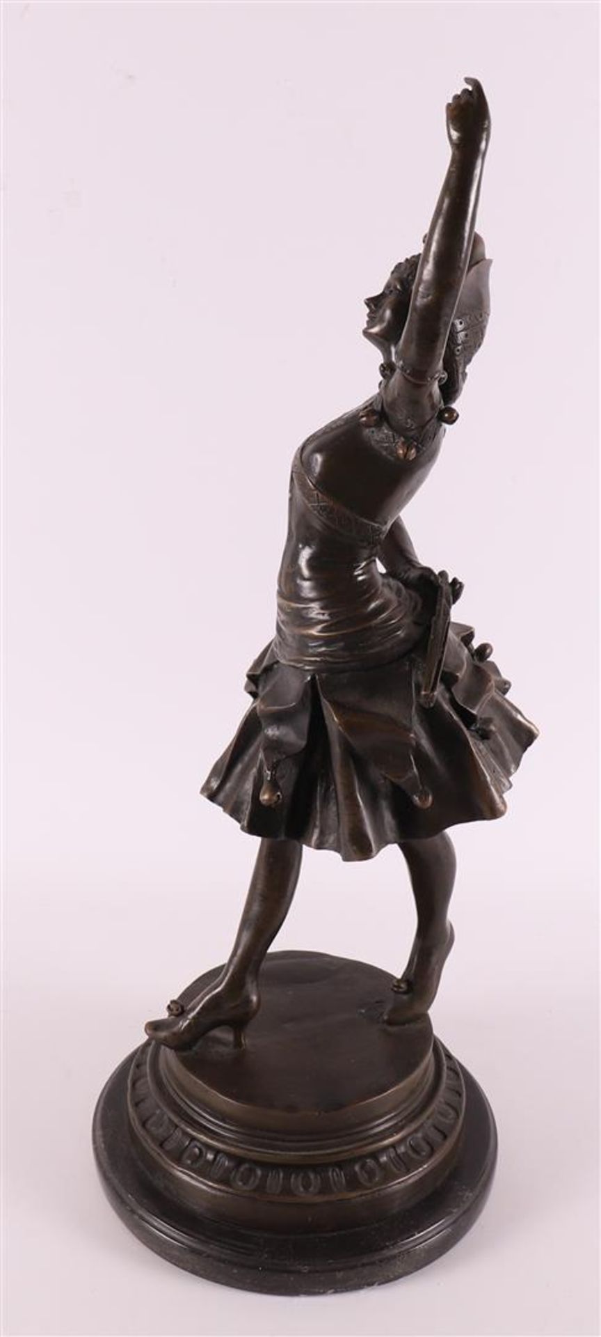 A brown patinated Art Deco dancer, based on an antique example, 21st century. - Image 4 of 4