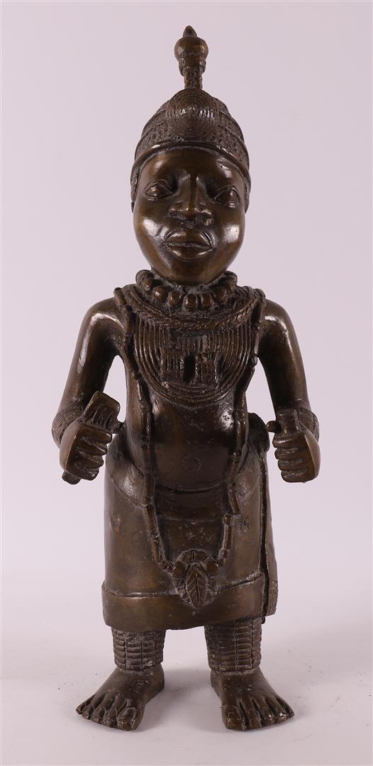 A brown patinated Benin bronze of dignitary, Africa, Nigeria,