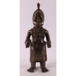 A brown patinated Benin bronze of dignitary, Africa, Nigeria,