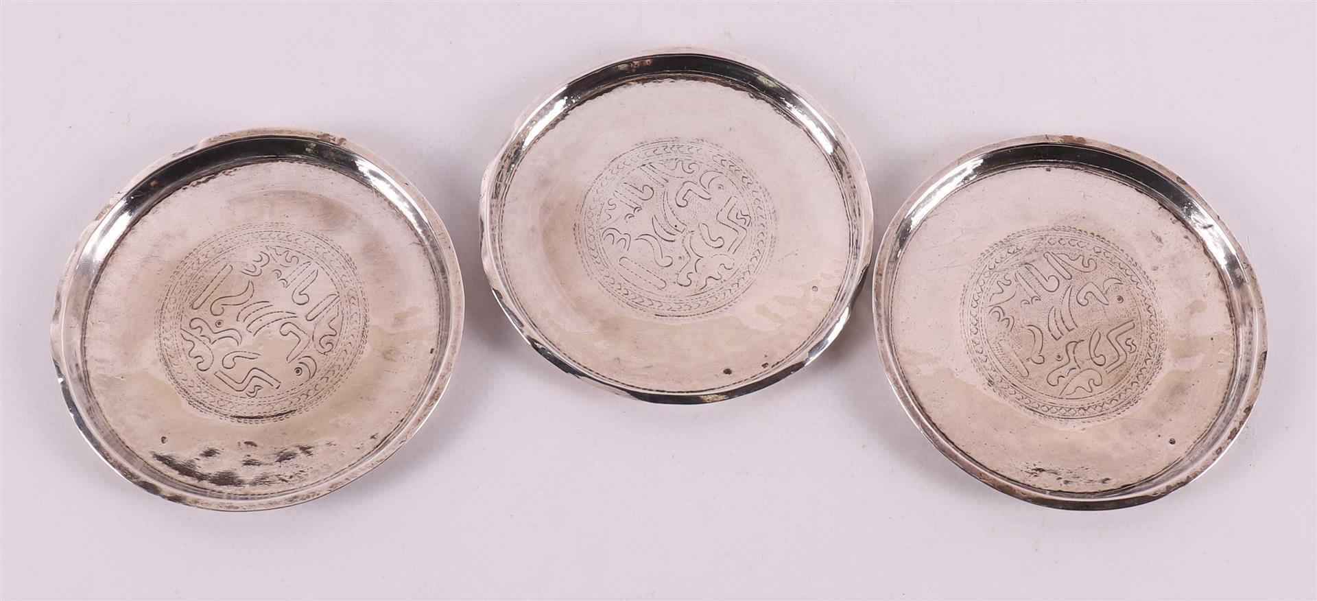 Three silver coasters with engraved Hebrew script, 1st half 20th century