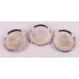 Three silver coasters with engraved Hebrew script, 1st half 20th century