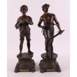 A set of brown patinated white metal 'samac' statues of a lute player and blacks
