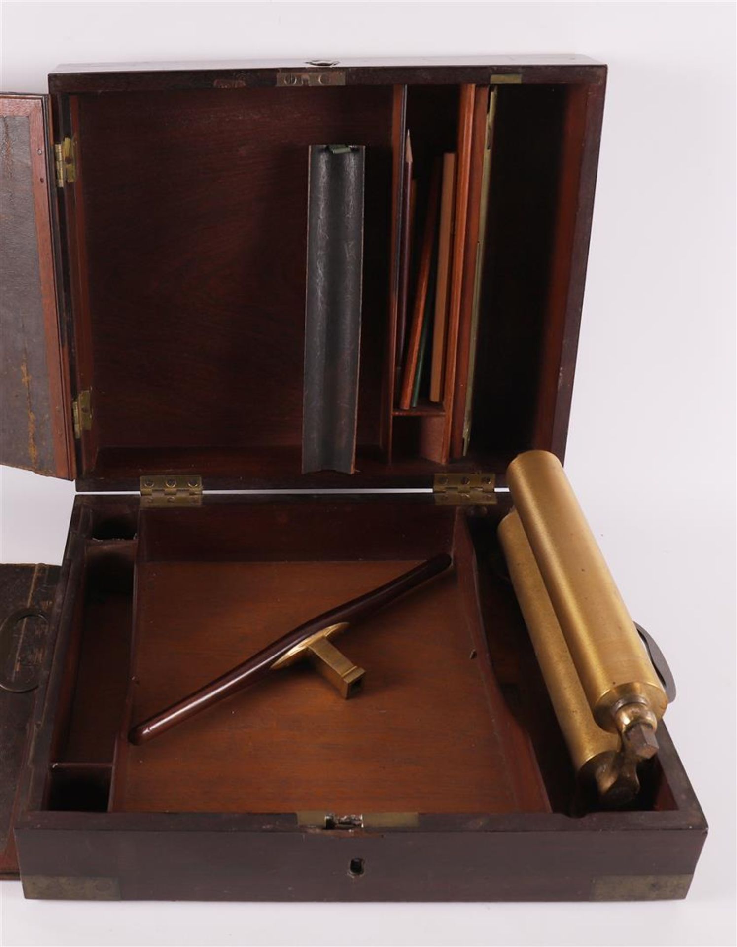 A walnut chest with pressure mechanism, 19th century.