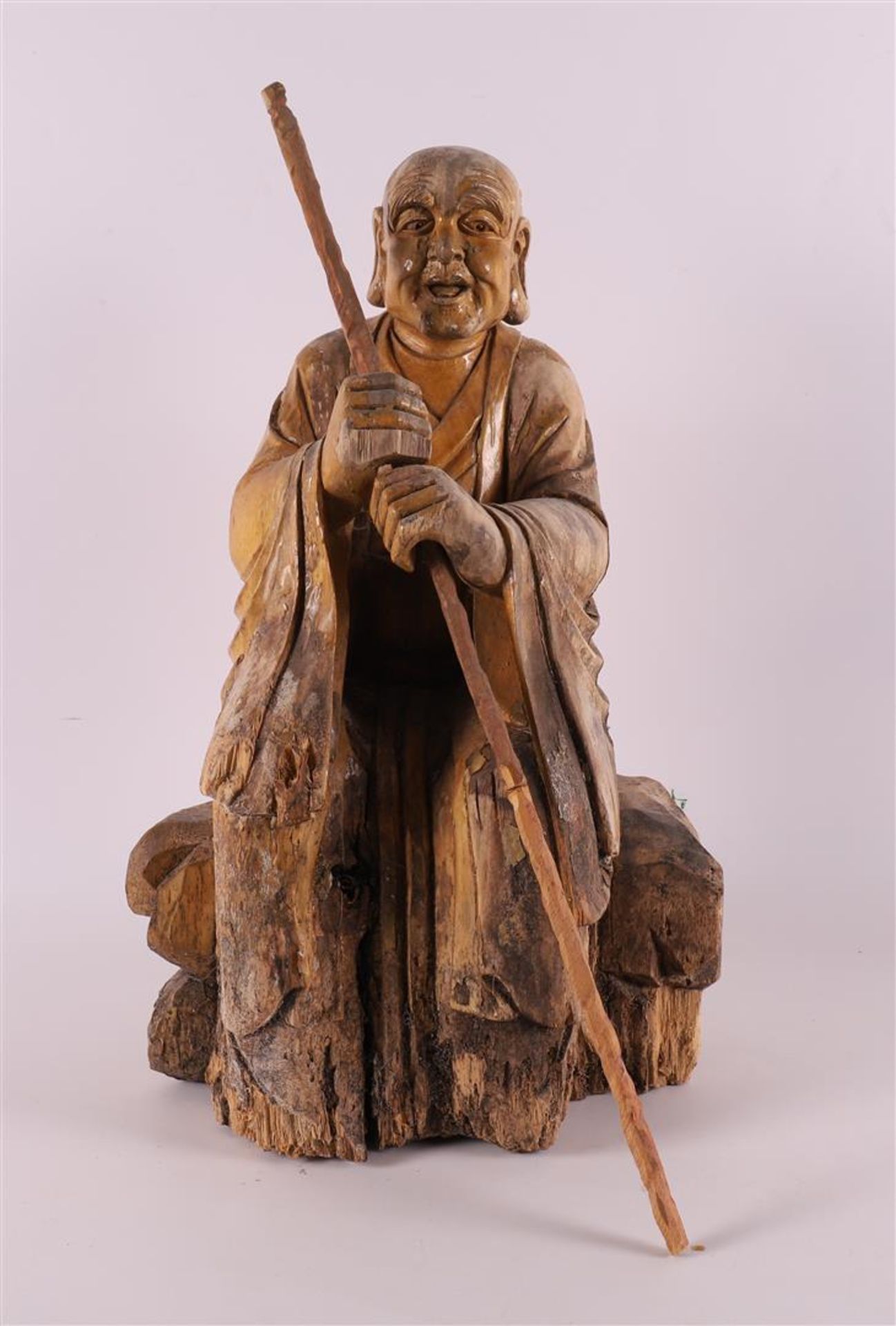 A carved wooden philosopher with staff, China, 2nd half of the 19th century.
