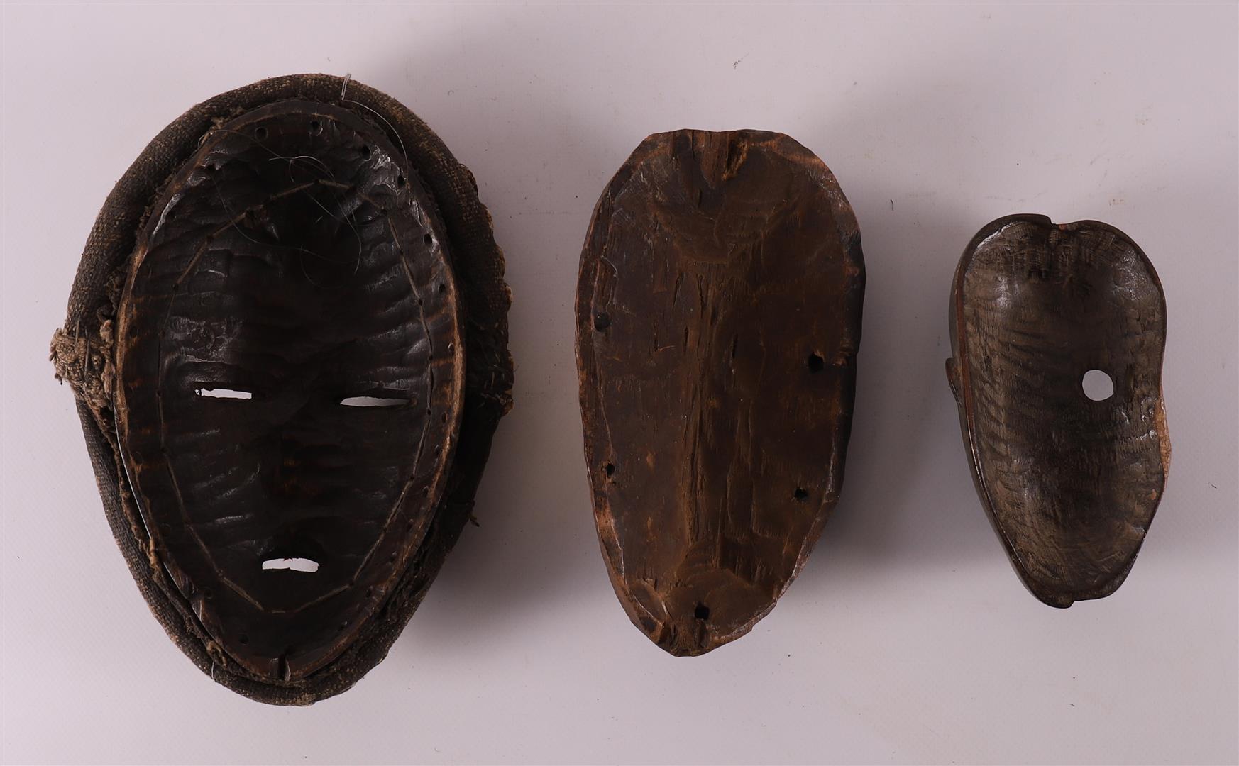 Ethnographic/tribal. Three various wooden masks, Africa, 20th century - Image 2 of 2