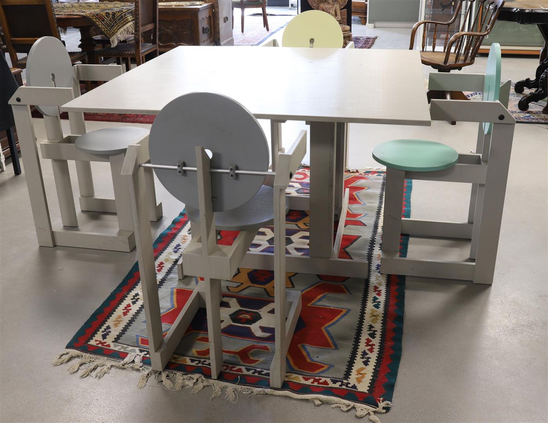 A designer dining room table and four chairs, design: Henk Lampe (Sneek 1951)