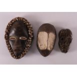 Ethnographic/tribal. Three various wooden masks, Africa, 20th century