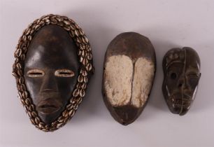 Ethnographic/tribal. Three various wooden masks, Africa, 20th century
