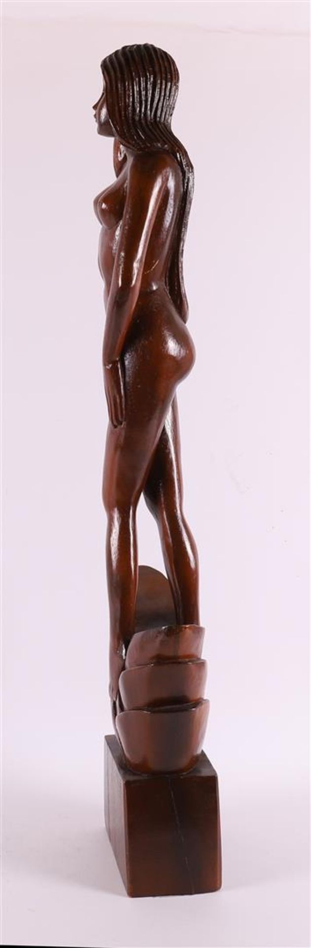 A carved tropical wooden sculpture of a female nude, 20th century. - Image 3 of 4