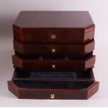 A burr walnut jewelry storage case with four drawers, Queen by buben & Zorweg,