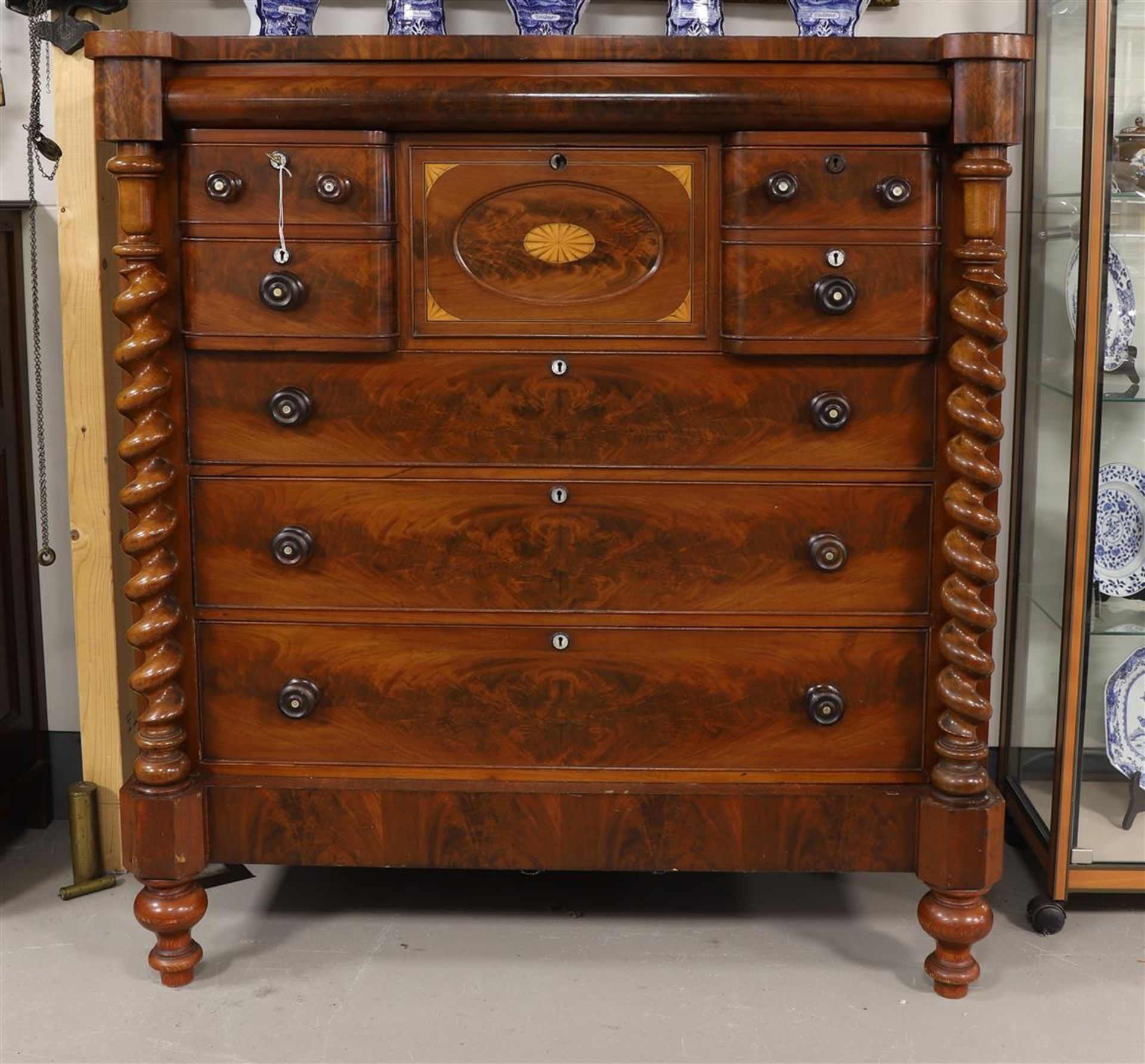 A chest of drawers, England, early 19th century.