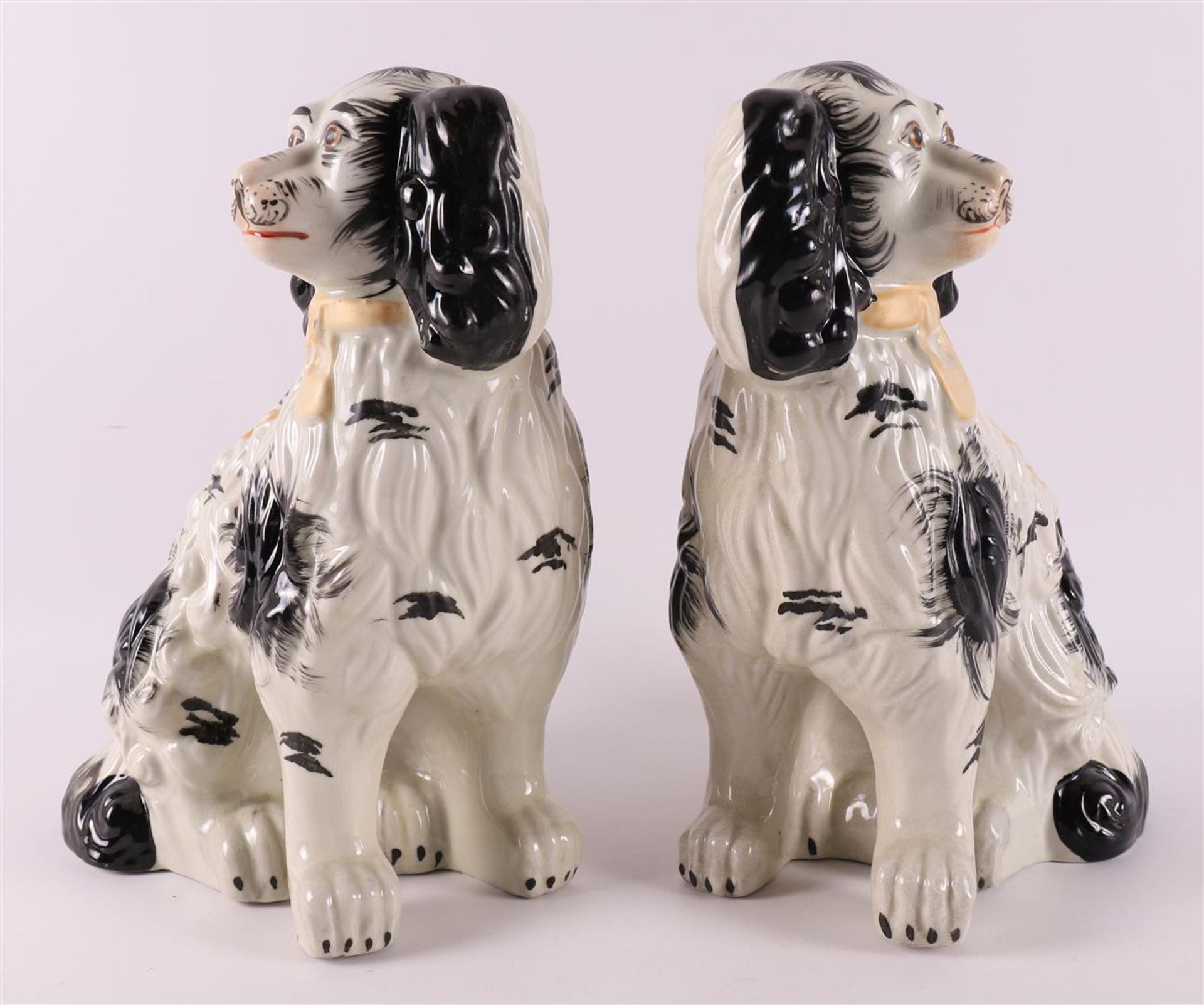 A pair of black and white earthenware dogs, England, Staffordshire, 19th century - Image 2 of 5