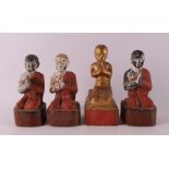 A series of carved wooden Burmese Buddhist monks, 19th/20th century