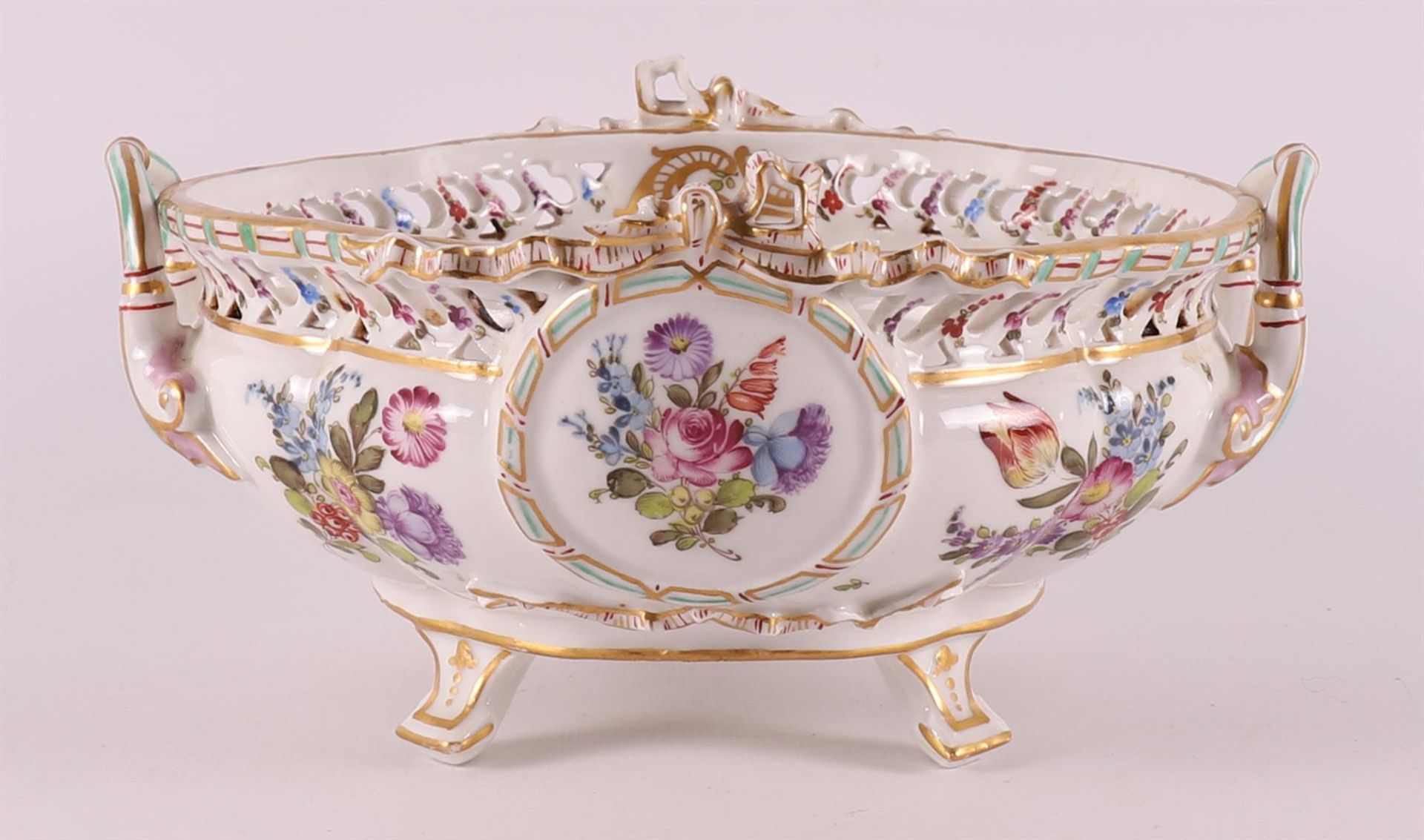 A porcelain fruit bowl, after a Meißen example, Germany, 20th century.