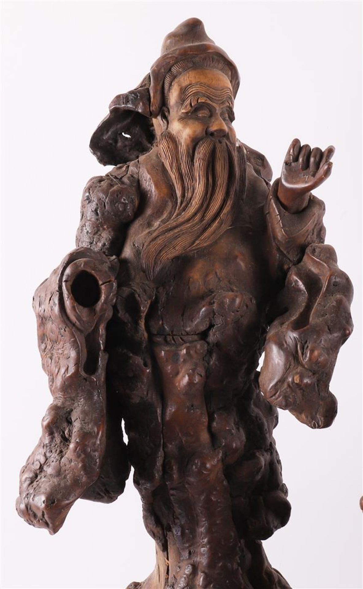 A carved burr walnut immortal on a stump, China, around 1900 - Image 2 of 8