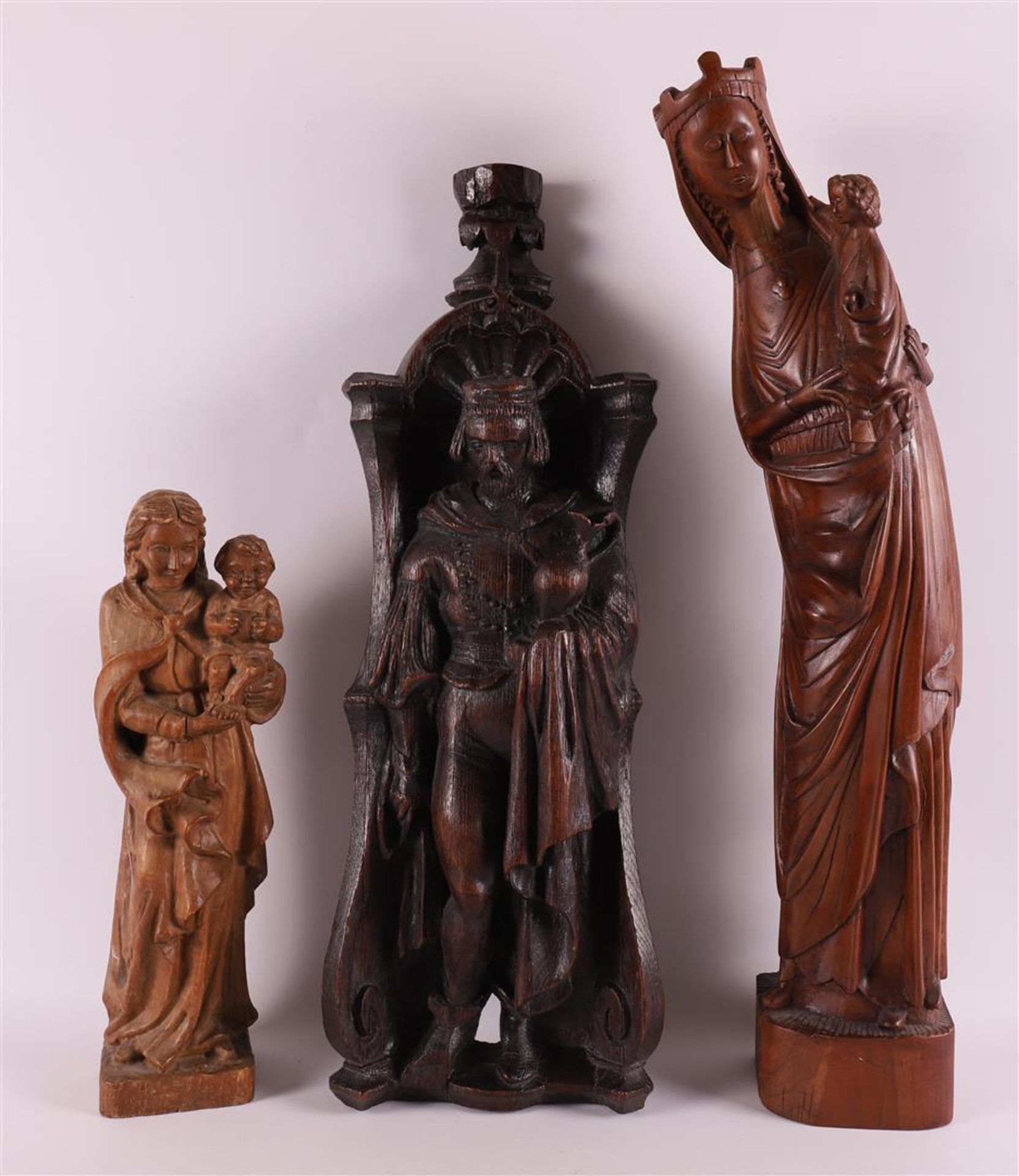 Three various carved wooden religious sculptures, including Mary with child, 20t