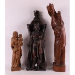 Three various carved wooden religious sculptures, including Mary with child, 20t