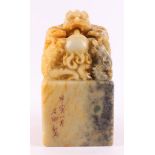 A soapstone stamp with relief of a dragon with pearl and boy, China,