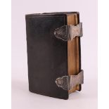 A Bible/psalm book in brown leather binding and silver clasp, 20th century
