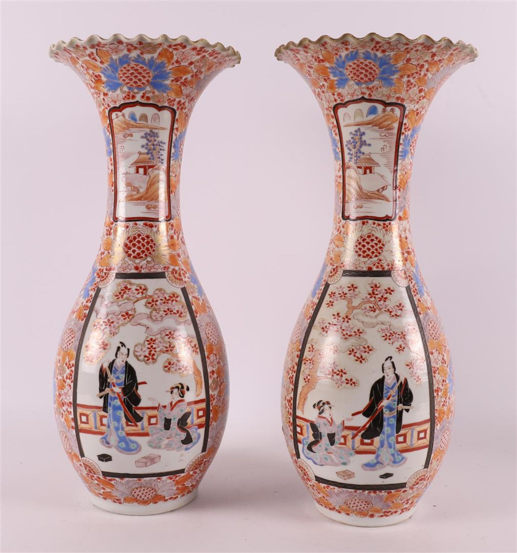 A pair of baluster-shaped porcelain vases with scalloped neck edge, Japan, Meiji