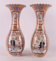 A pair of baluster-shaped porcelain vases with scalloped neck edge, Japan, Meiji