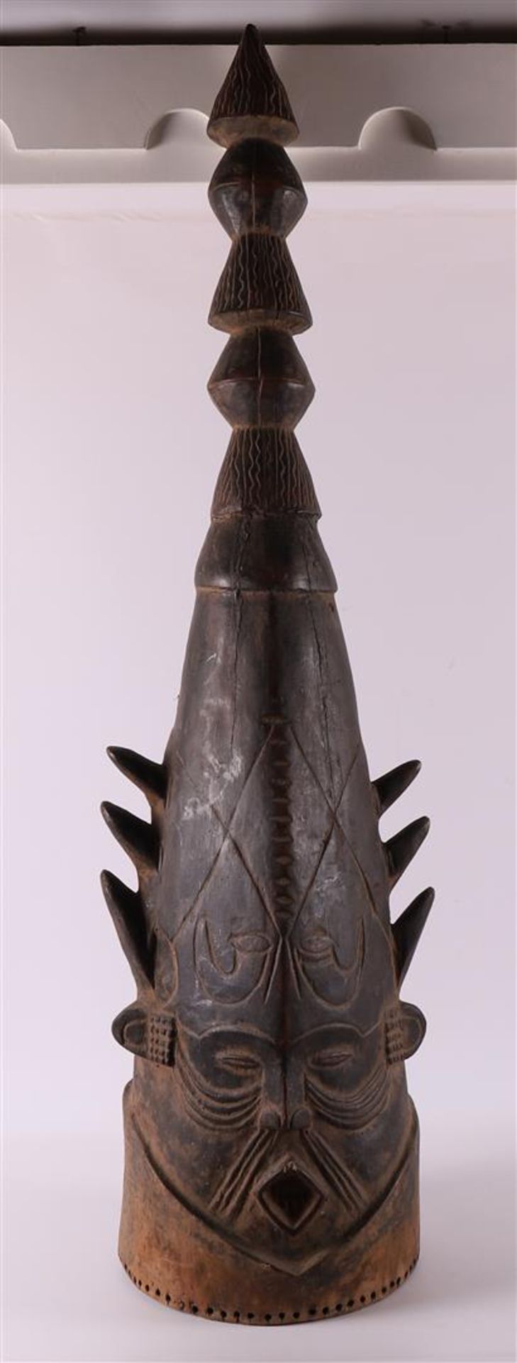 A carved wooden 'Odudu helmet mask', Nigeria, Africa, 2nd half of the 20th centu