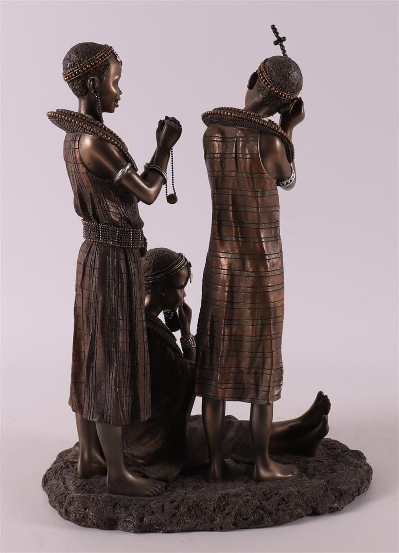 A bronze sculpture group 'Tayari Finischin Touches', reproduction, Africa. - Image 3 of 4