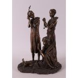 A bronze sculpture group 'Tayari Finischin Touches', reproduction, Africa.