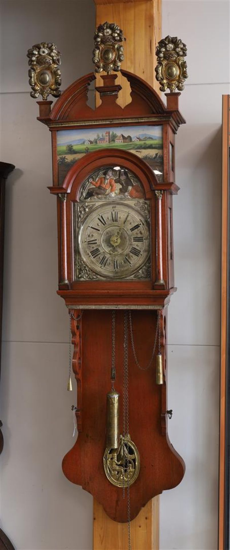 A Groningen model tail clock, 19th century.