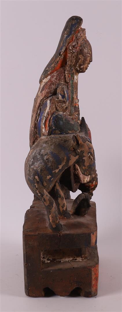 Kwanyin on an ox with traces of polychromy, China, Qing dynasty. - Image 2 of 4