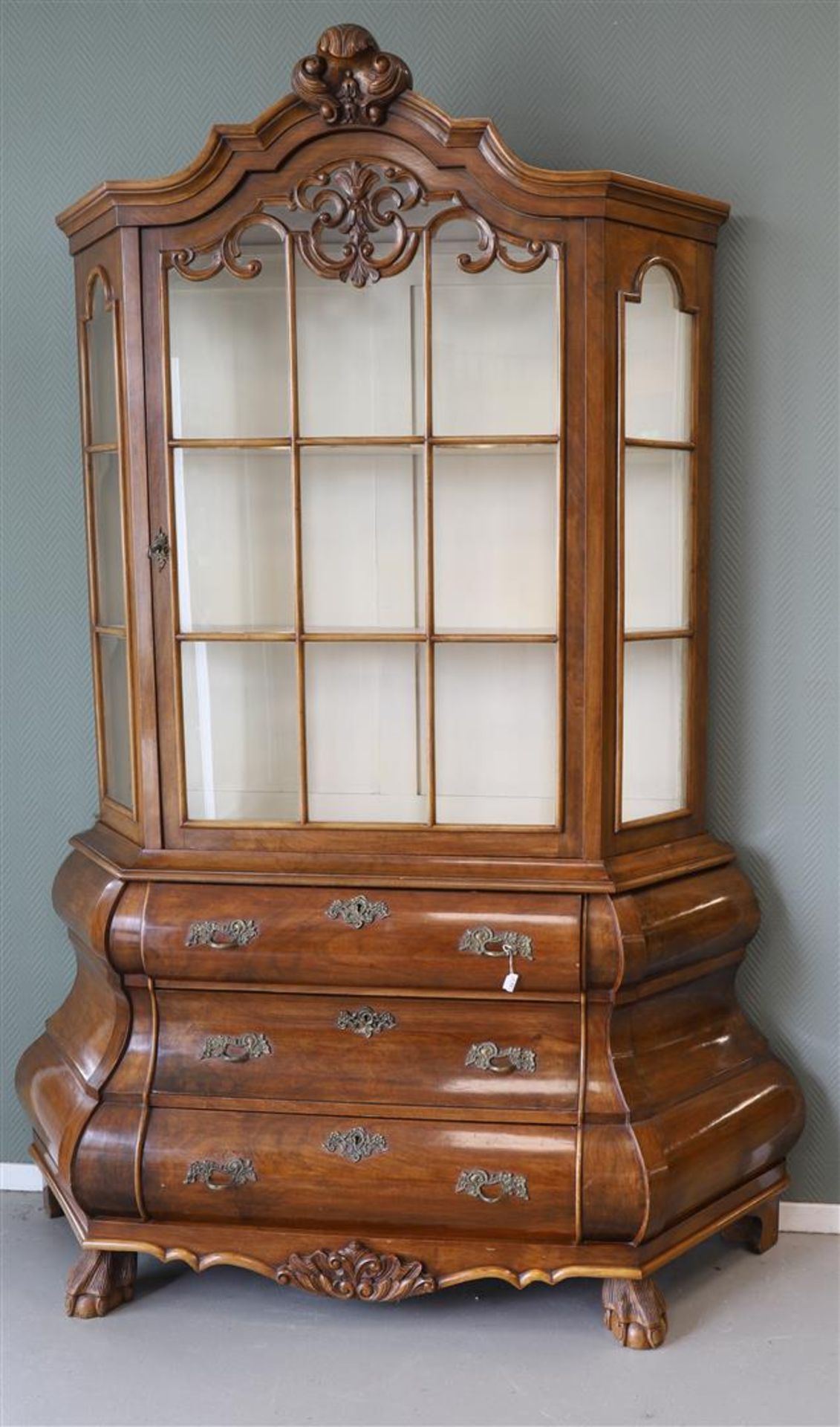 A one-door porcelain/display cabinet, Dutch, Louis Quinze style, 20th century.