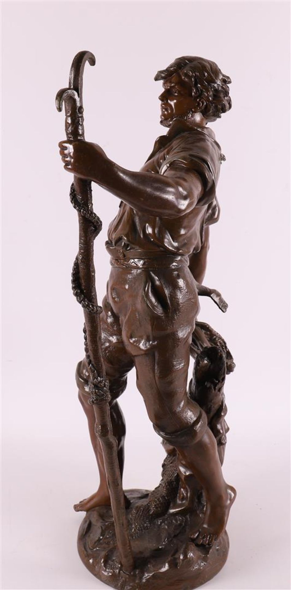 A brown patinated white metal 'samac' sculpture of a fisherman, France, - Image 5 of 6