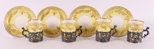 A series of four rococo style cups and saucers, England, Staffordshire,