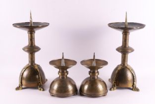 Four hammered brass Amsterdam school church candlesticks, ca. 1930.