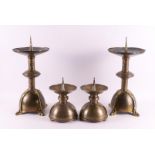 Four hammered brass Amsterdam school church candlesticks, ca. 1930.