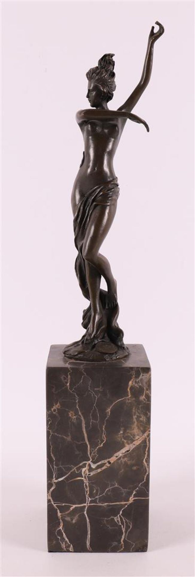 A brown patinated bronze female nude sculpture, after an antique example,