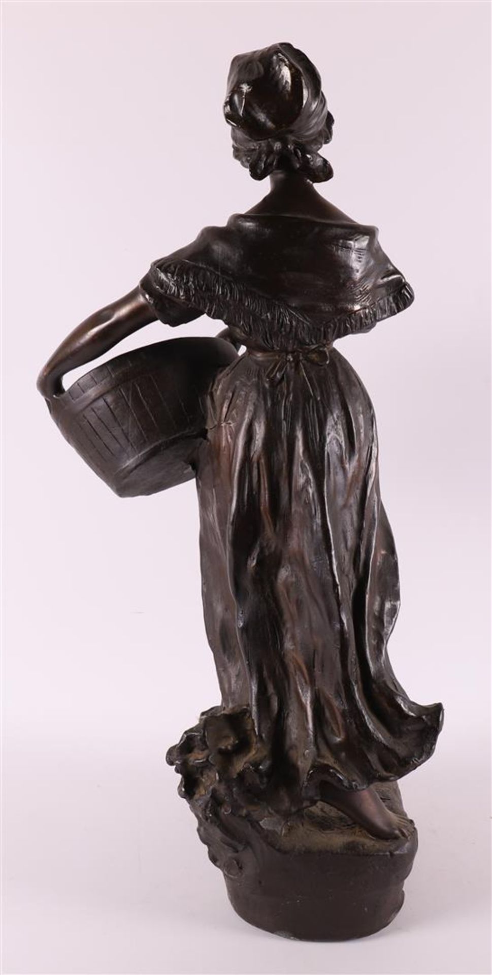 A brown patinated white metal 'samac' woman with basket, France around 1900. - Image 4 of 5