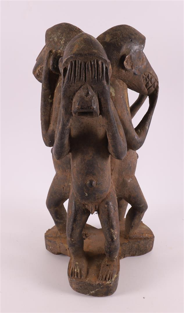 A carved sculpture 'Hear-See-Silence', Africa, 2nd half of the 20th century. - Image 2 of 3