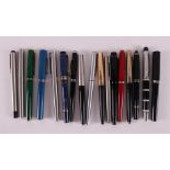 A lot of various fountain pens, including Parker and Shaeffer