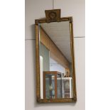 A rectangular Empire mirror in a gilt profile frame, ca. 1810.