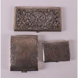 Two third grade 800/1000 silver cigarette cases, including Djocja, early 20th ce