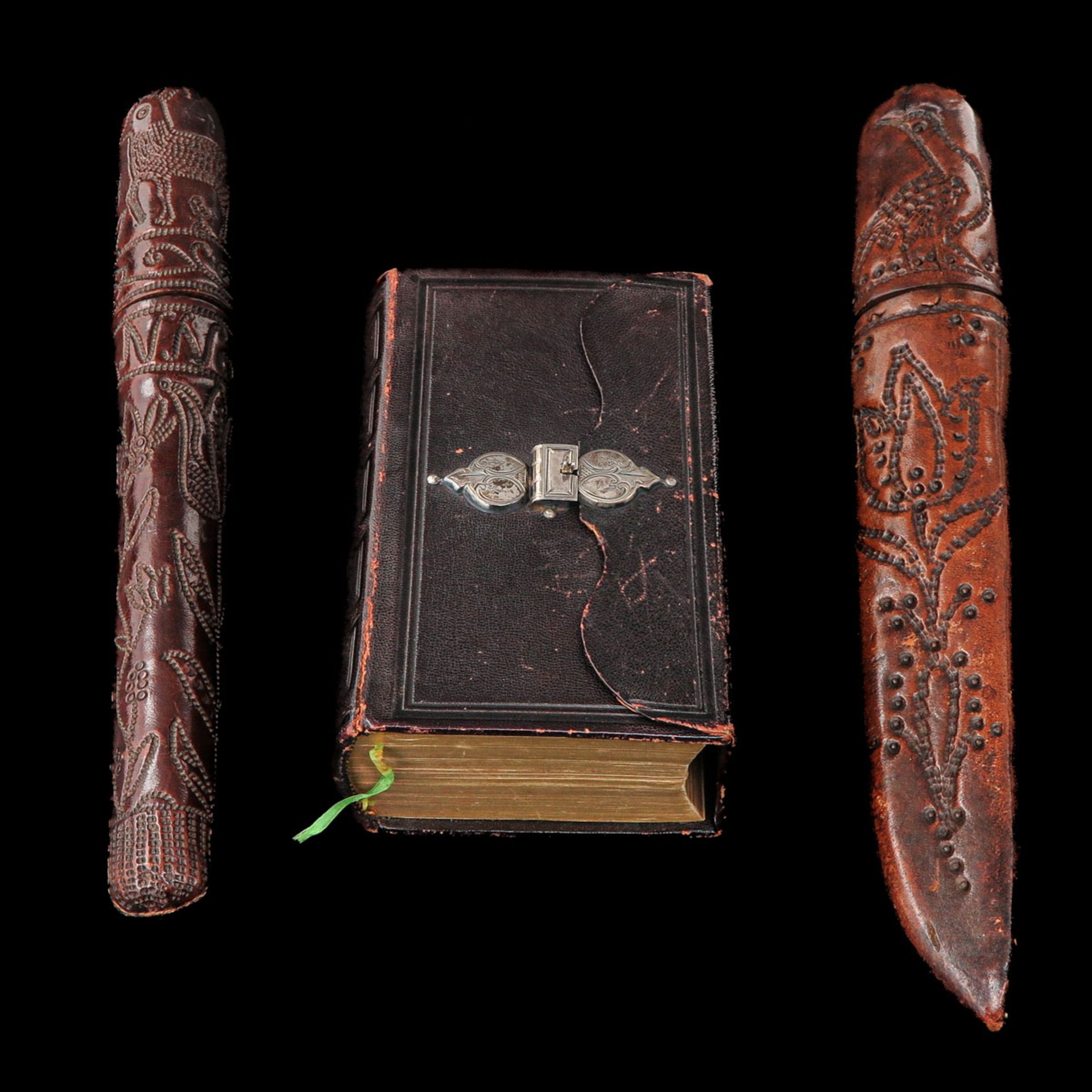 A Bible and 2 Scabbards