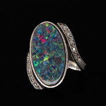 An 18KG Diamond and Opal Ring