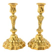 A Pair of Bronze Candlesticks