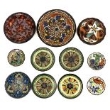 A Collection of 11 Pottery Dishes