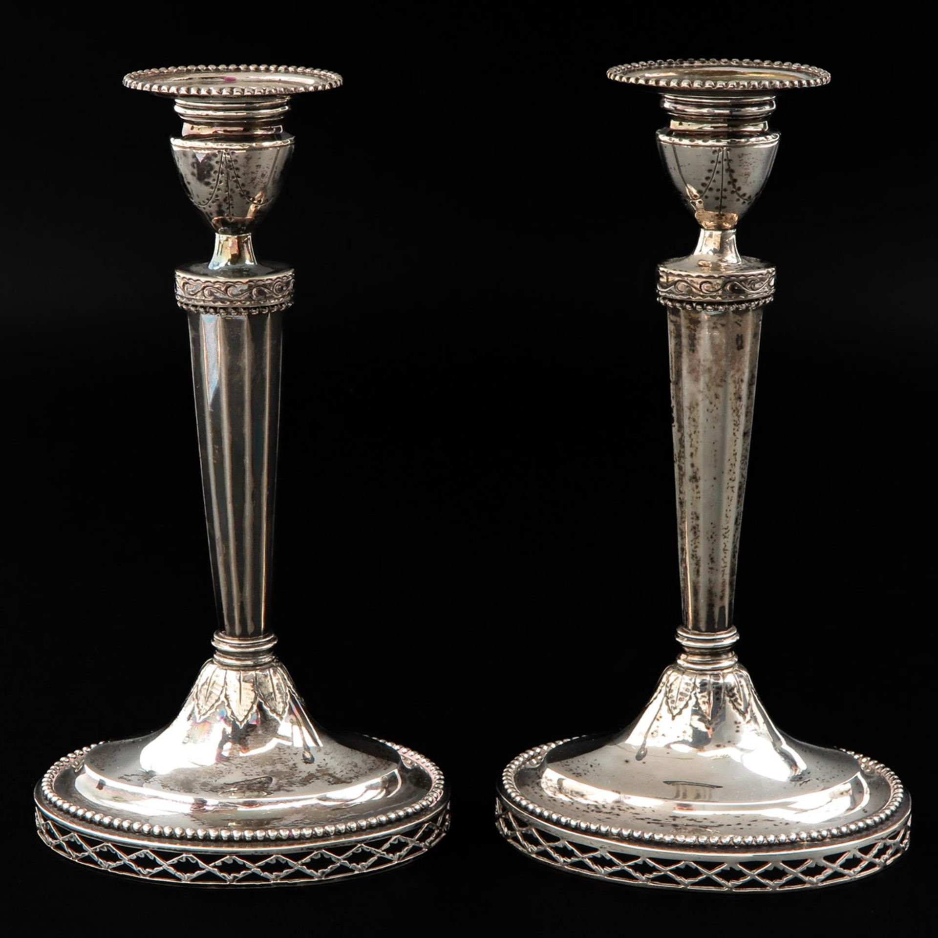 A Pair of Silver Candlesticks